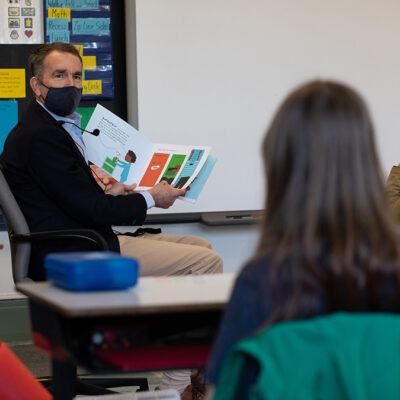 Governor Ralph Northam reads a book to school children