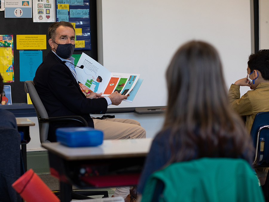 Governor Ralph Northam reads a book to school children