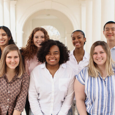 Seven UVA students who produce the Still We Rise podcast in a group photo