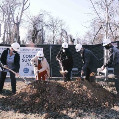 South First Street residents and city officials dig into dirt with shovels