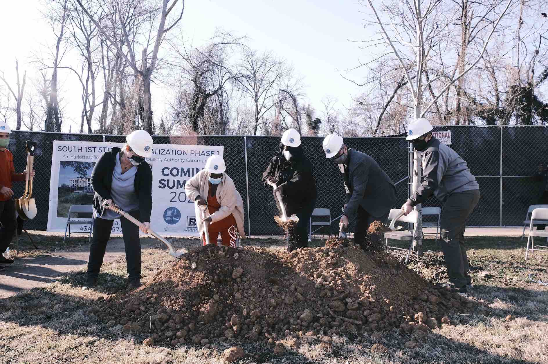 South First Street residents and city officials dig into dirt with shovels