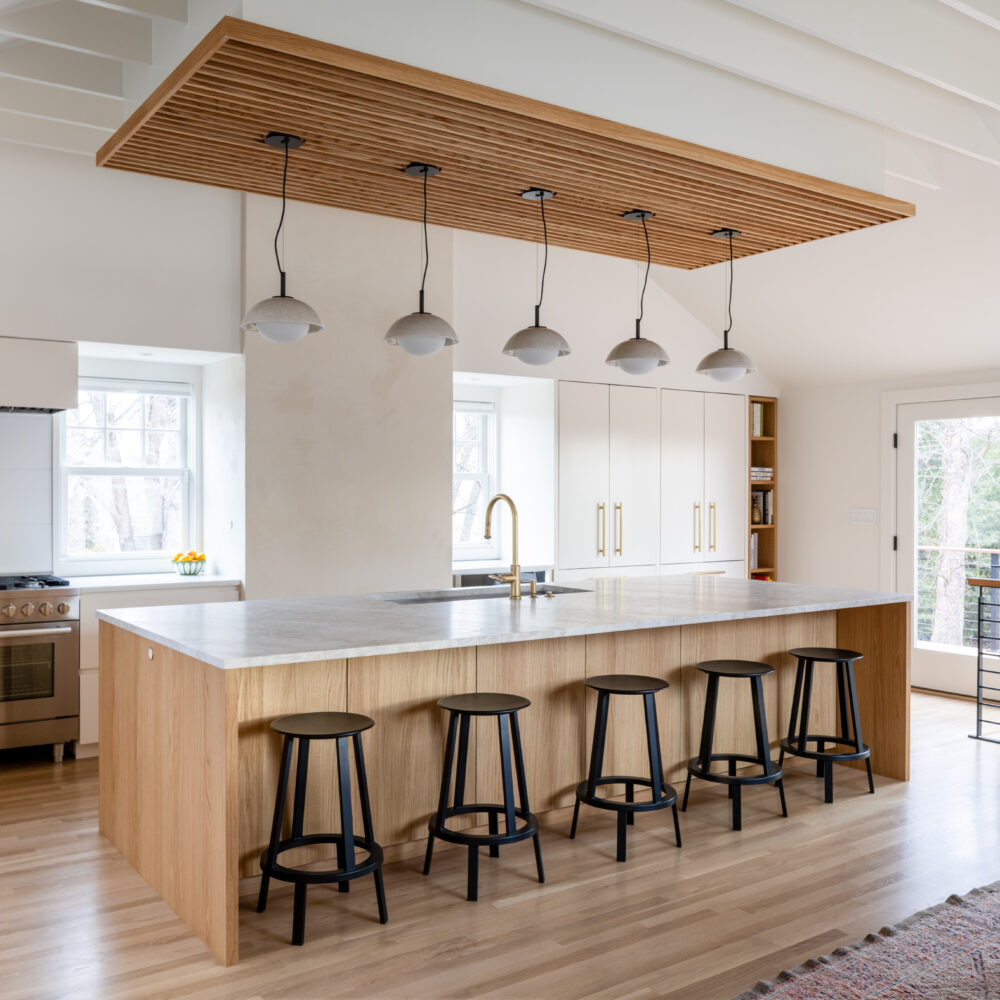 A doubled footprint, natural lighting, and thoughtful finishes transform a family kitchen